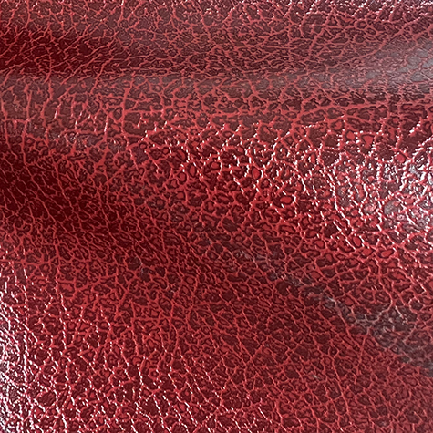 legatoria EcopelleMACULATA VenaturaProfonda, g2300 BORDO' in rotoli altezza 34cm, 275 grammi-mq, per rilegatura, legatoria, cartonaggio, Rivestimento specifico per stampa con termopressa-tranfer .