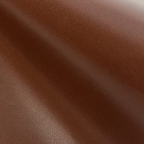 legatoria EcopelleMaculata VenaturaLeggera, pvc10557, MARRONE in rotoli altezza 50cm, 220 grammi-mq, Rivestimento specifico per stampa con termopressa-tran.