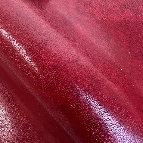 legatoria EcopelleMaculata VenaturaLeggera, pvc1071 ROSSO In foglio 326x500mm, 240 grammi-mq, Rivestimento specifico per stampa con termopressa-transfer, per rilegatura, legatoria e cartonaggio.