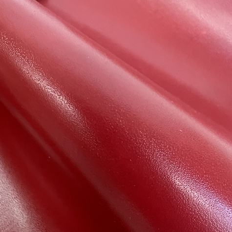 legatoria EcopelleTintaUnita VenaturaLeggera, 1079 ROSSO  in rotoli altezza 50cm, per rilegatura, legatoria, cartonaggio .